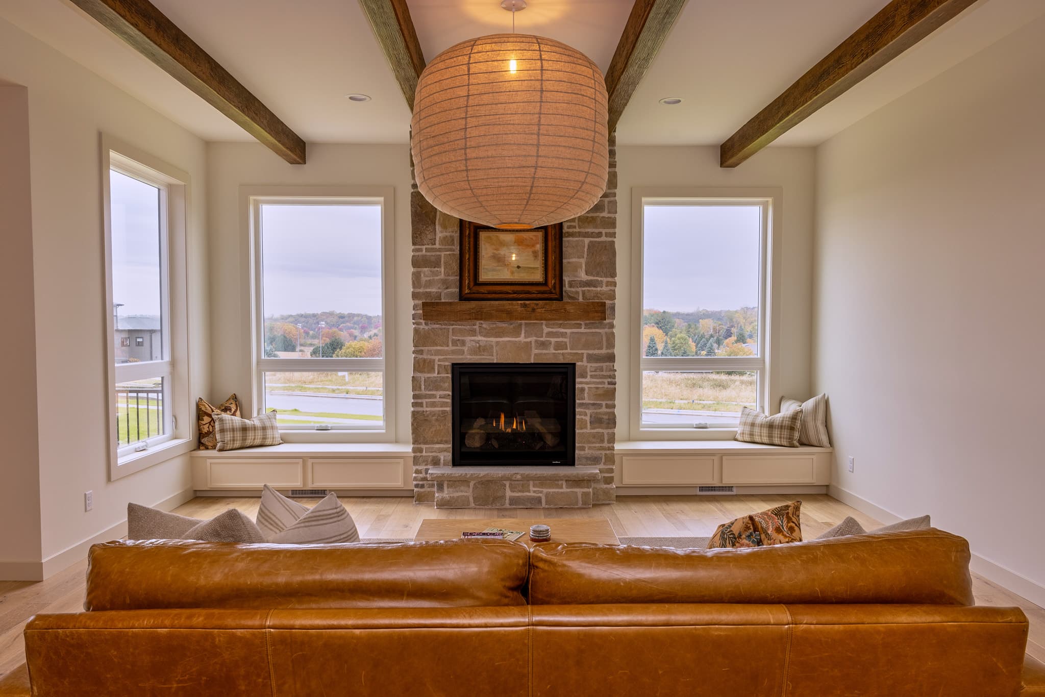 North Design Build — living room with stone fireplace